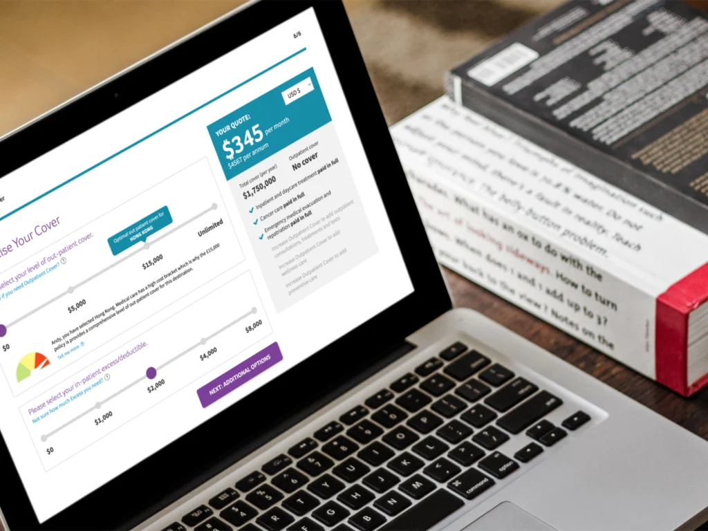 MacBook showing insurance quote and buy screens